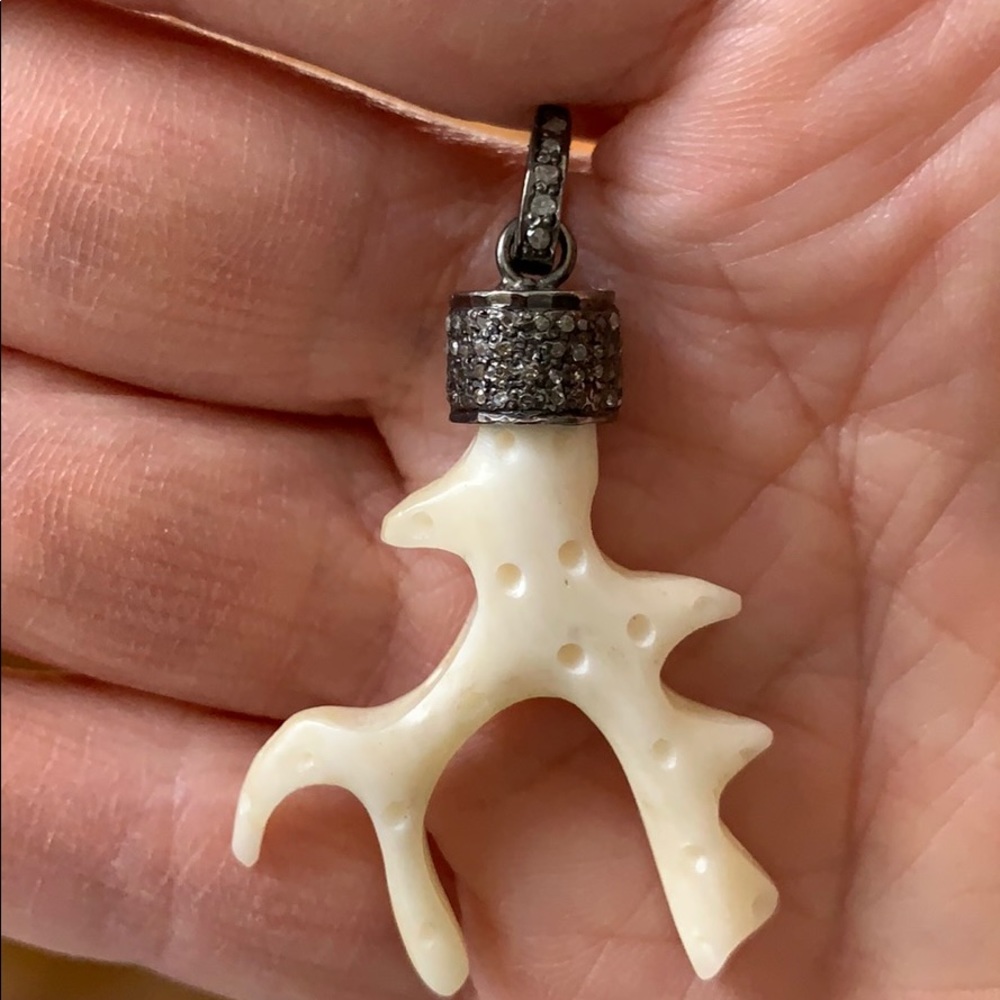 Bone pendant with stones